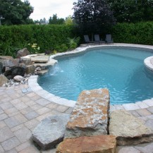 Ottawa swimming pool with diving rock for fun summers