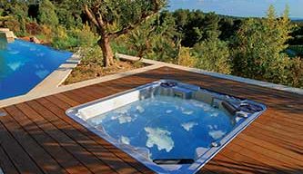 Inset hot tub in a raised decking with beautiful view