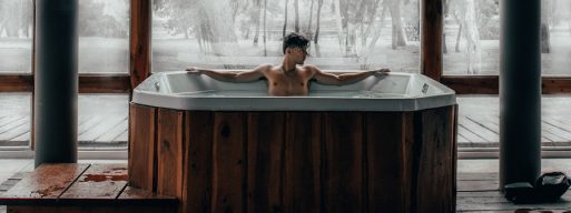 Man uses indoor hot tub