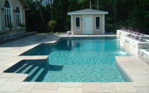 A boxy pool with fountains