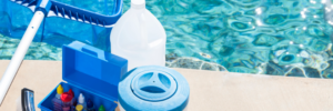 view of water cleaning items and chemicals for chlorine and saltwater pools
